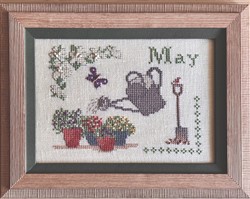 May a Month in the Garden - Watering Can